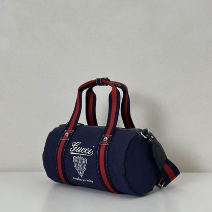 Gucci Pre-Owned Crest Printed Canvas Duffle Bag in blue canvas