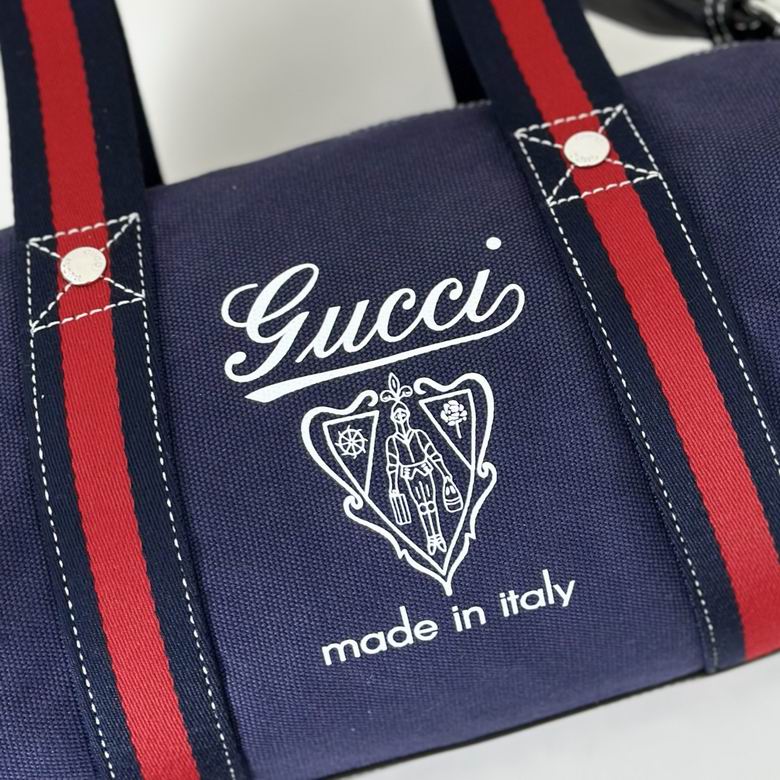 Gucci Pre-Owned Crest Printed Canvas Duffle Bag in blue canvas