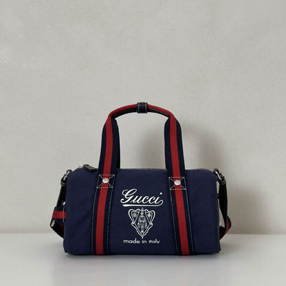 Gucci Pre-Owned Crest Printed Canvas Duffle Bag in blue canvas
